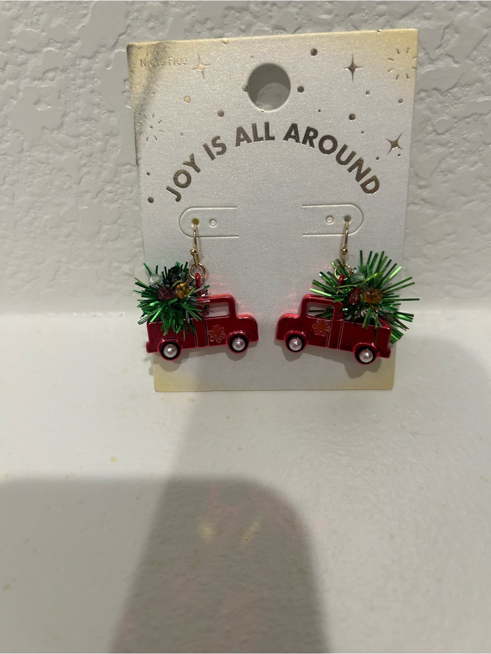 Festive Red Truck Earrings with Green Tree Accents -